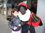 Met Zwarte Piet op de foto
